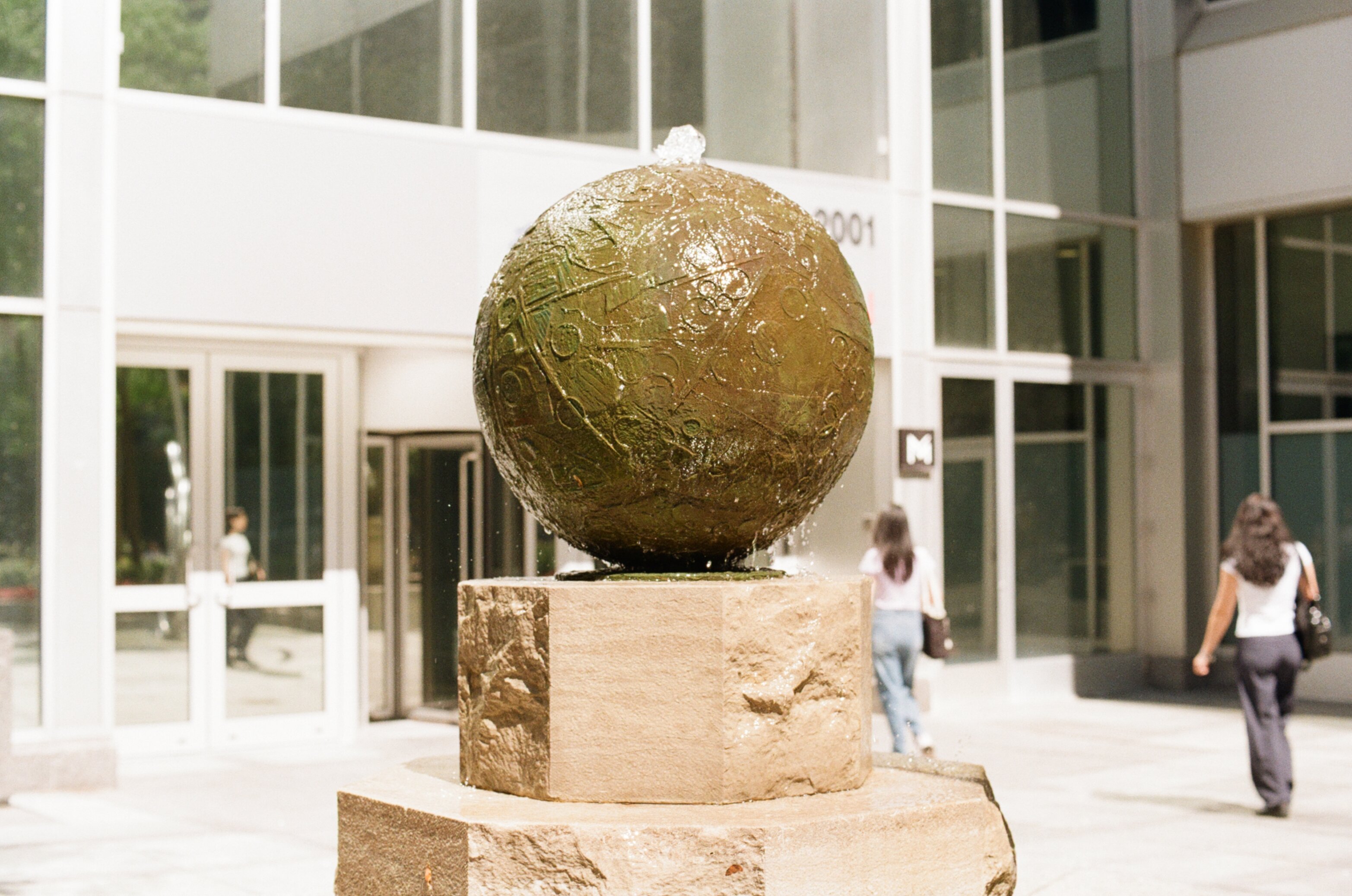 Ball-shaped water fountain in the day