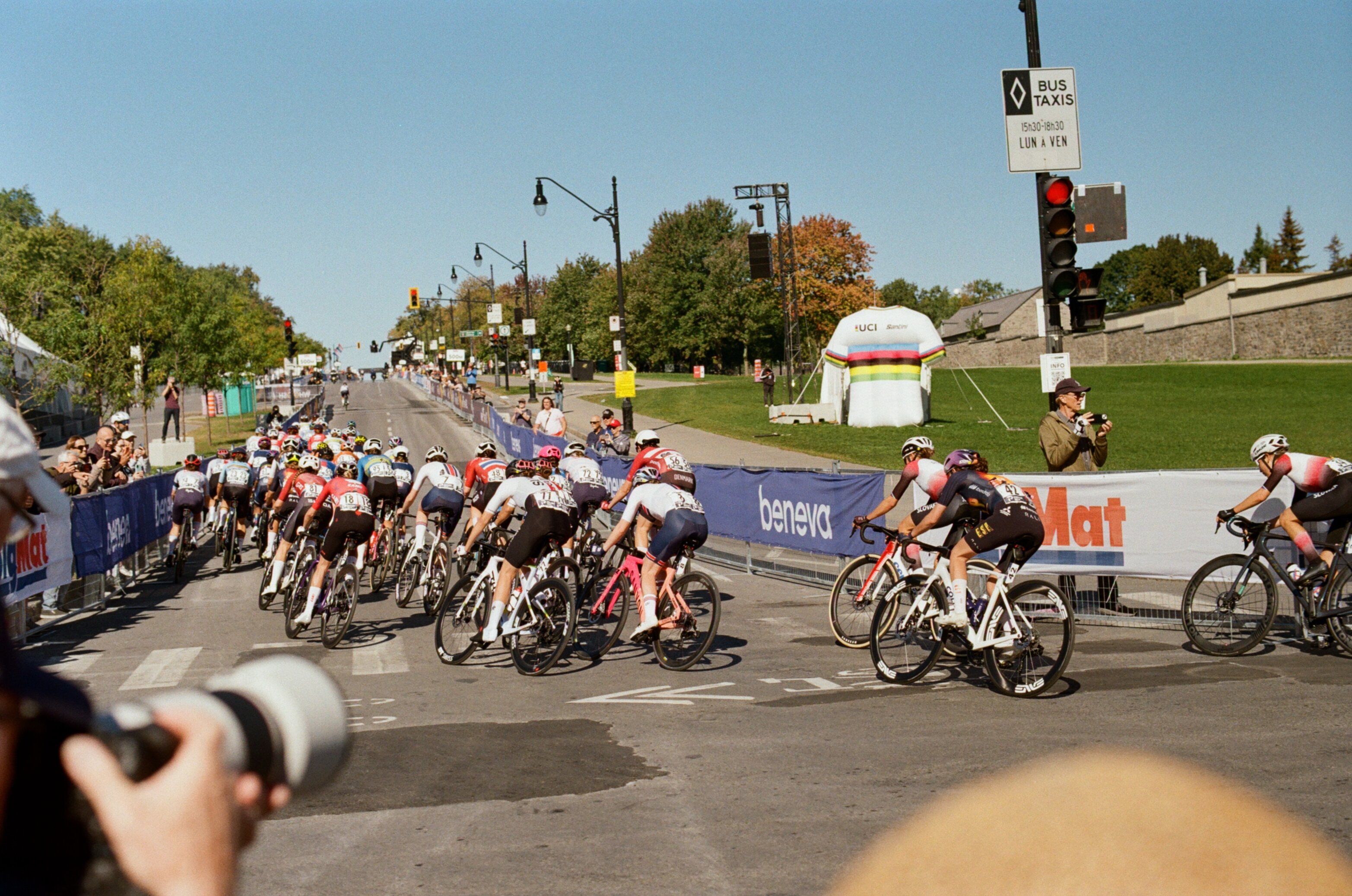 Cyclists round a corner in a women's bike race