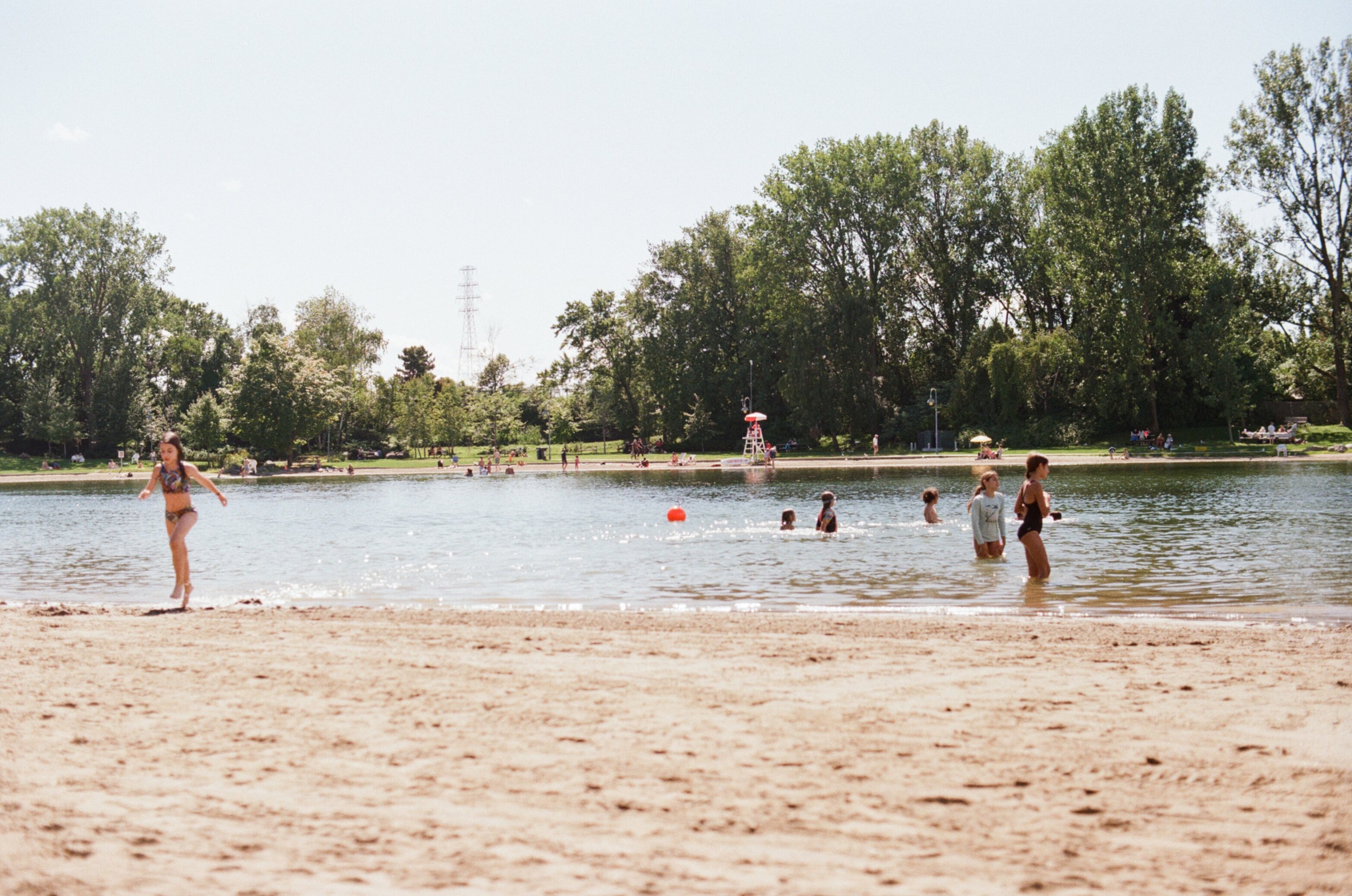 Kids play in the water at the beach